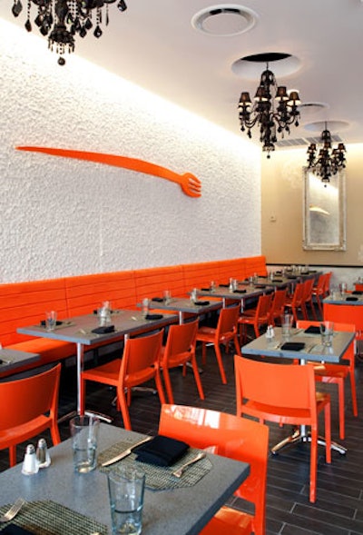 A bright orange fork (forchetta in Italian) hangs on the wall in homage to the restaurant's name.