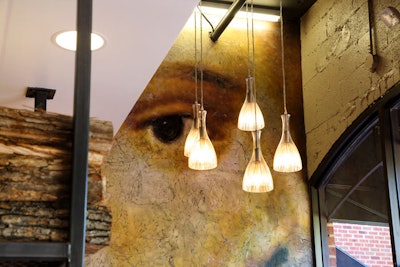Atlanta artist Caara Stoney created two 11-foot-tall Renaissance-inspired art installations for La Forchetta.