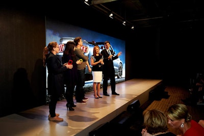 As the evening came to a close, AOL C.E.O. Tim Armstrong (pictured, far right) and actress Marlo Thomas (second from right) took the stage to announce the winner of a new Ford Mustang. The audience was instructed to look under their seats for one of three color-coded keys. Thomas then chose her favorite color and the person holding that color was awarded the car. In honor of each runner-up, AOL promised to donate $10,000 to St. Jude Children's Hospital.