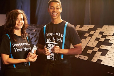 To help reduce lines, ushers in 'Responds to Your Needs' T-shirts passed programs and instructed guests to find their name tags. The event's designer, Baura New York, created a magnetic structure to hold the badges, which came in two different colors, black and white.