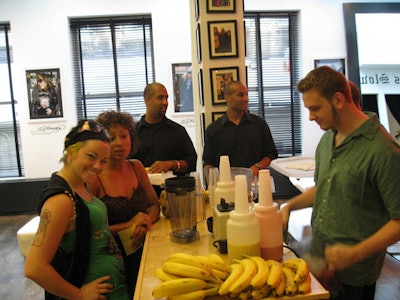 A Maui Wowi smoothie bar at an Ed Hardy store event