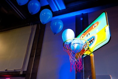 Balloons linked one basketball hoop to the other. The playful court was supposed to represent a game of good versus good.