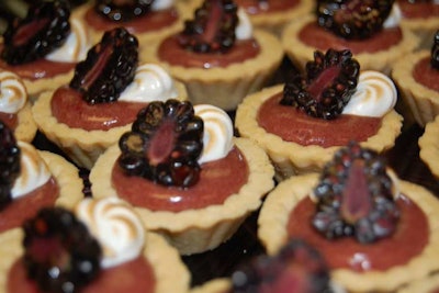 Blue Plate Catering provided desserts for the reception. Menu items included mini blackberry tarts with blackberry curd and toasted meringue.