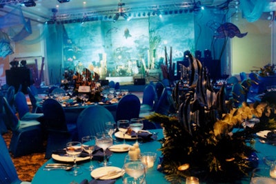 Under the sea themed tables with angel fish and flowers