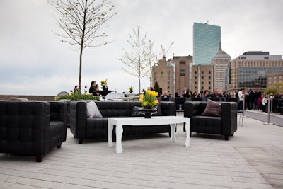 Guests witnessed the spectacle from the hotel's pool deck, where furniture rentals came from Party by Design.
