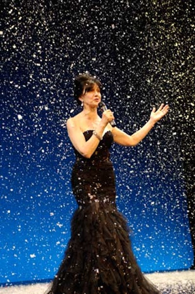 A fake snow shower fell upon the stage during the paddle raise, which raised money for programming like the ballet's upcoming Nutcracker.