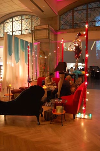 Decor & More created eclectic lounge areas with mismatched furniture, zebra-print rugs, and lamps shaped like a woman's leg. Colourful lights hung overhead.