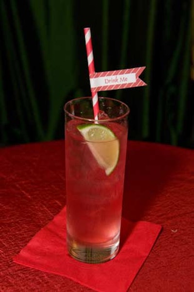 The Queen of Hearts cocktails during the reception came with red and white striped straws that read “Drink me.”