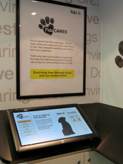 At interactive touch screens inside the trailer, guests could explore the FidoCares tour map, photo albums, journal, tour checklist, and contests.