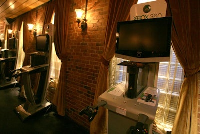 Xbox 360 gaming stations let guests test out the new game, which officially launches next week.