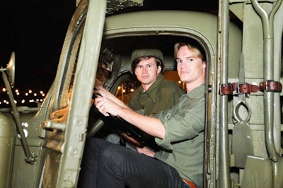 Guests posed for photos in WWII-era vehicles.