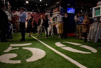 Inside the 10,000-square-foot space, the league has decked out the floor with grass-like turf and lines designed to mimic a football field.