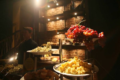 In addition to passed hors d’oeuvres like truffled grilled cheese and lamb on rosemary skewers with mint chutney, caterer Olivier Cheng set up a cheese and fruit station on the second floor.