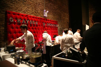 Chefs like Daniel Boulud and Gavin Kaysen served their dishes in front of plush red velvet walls that spelled out their names in metal signage.