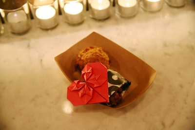 Questlove, who served as the event's DJ, recently launched his own catering company, Quest Loves Food. Waiters passed the musician’s signature origami-wrapped fried chicken drumsticks.