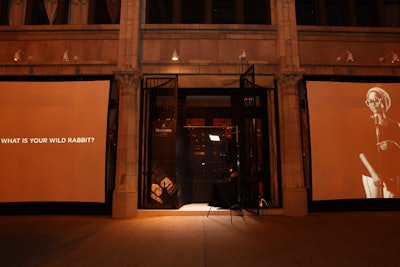 The campaign's television spots appeared on the exterior of the restaurant.