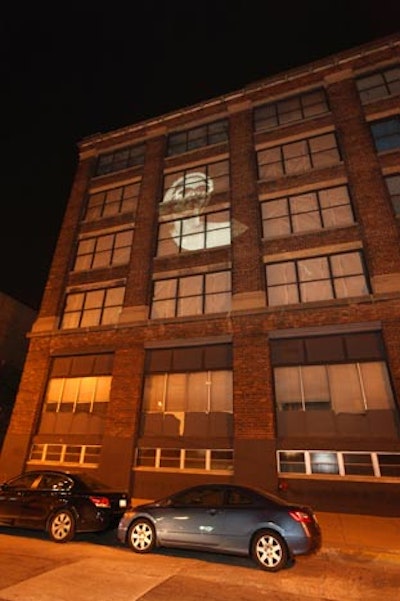 A Hennessy gobo illuminated the entrance to Nellcôte, and still images from the ad campaign appeared on a nearby building that's set to become the Soho House Chicago.