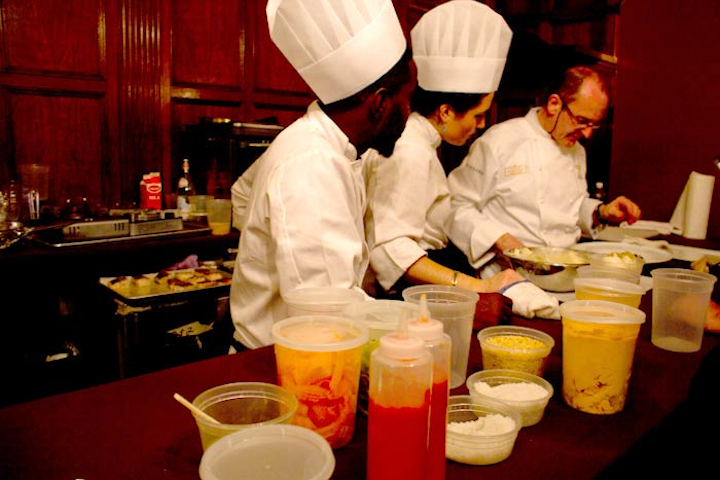 It was time to slap on the old feedbag. Being a journalist—well, sort of—they let me go backstage and check out the kitchens, which were set up all around the oval-shaped dining area. The event had 45 chefs and their sous chefs and captains and sauciers, and it was kind of comical to see them all slaving away on top of each other. Comical but tense. Very tense.