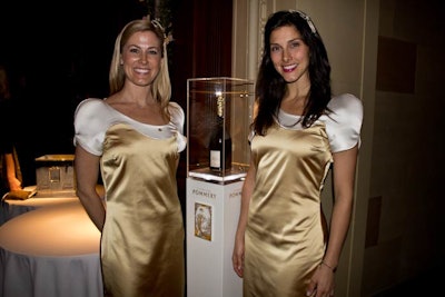 Upstairs for champagne (no booze, there were a few philistines grumbling) hosted by Pommery, the hired greeters from Cosmopolitan Management wore these cap-sleeved gold lamé numbers well. The dresses came from France, but neither of these ladies had remembered to look at their tag, so I left it at that.