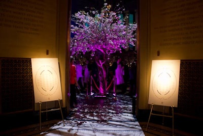 Time for dinner. And the entry was pretty spectacular. One giant tree of cherry blossoms lit seriously from above. It was a beautiful spectacle, if a wee bit crowded for the area it stood in. And I’m not sure the table charts needed that much incandescence ... but then again, I had a handler, and didn’t need to hunch and squint.