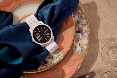 Guests received watches, which they found wrapped around napkins at their place settings, and a new pair of jeans.