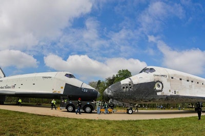 The Discovery and the Enterprise meet nose-to-nose at the Udvar-Hazy Center. The Enterprise flies to its new home at the Intrepid Sea, Air & Space Museum in New York April 23.