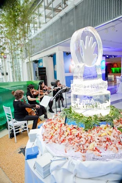 The cocktail reception took place in the 11th floor Sky Cafe, where a raw bar stayed chill with an ice sculpture bearing the hospital's logo.