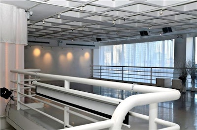 Mezzanine overlooks the main bar with an unobstructed view of the West Side.