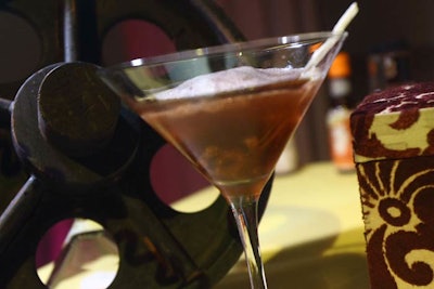 Smith Common's Phil Peters selected Jack Daniel's Tennessee Honey as his main liquor mixed with bourbon puree, brandy- and cherry-infused sweet vermouth, and smoked bitters, topped with darkened cherry air and a green apple sugar straw.
