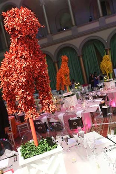 Edge Floral Event Designs created large centerpieces shaped like dogs to top select tables in the V.I.P. area.