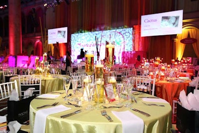 Design Cuisine used a mix of lime green, orange, pink, and yellow linens on the dinner tables.