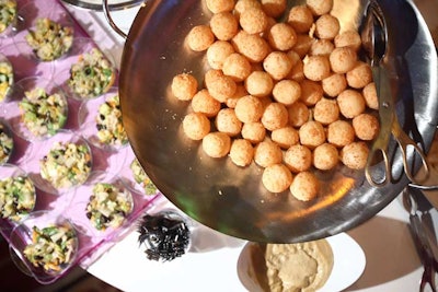 Light bites in the V.I.P. reception included yucca fritters and small salads.