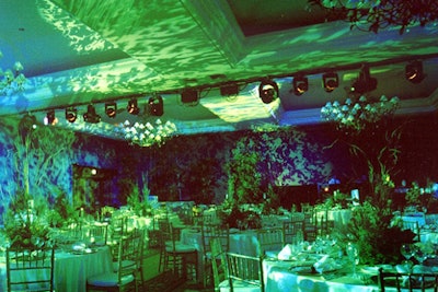 Get lost in a forest with green centerpieces and lights