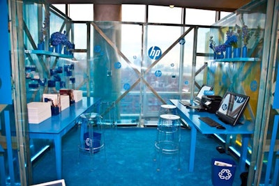 To highlight the CMYK motif, the organizers created four distinct areas within the venue, each inspired by one hue. In the cyan vignette, blue tables, carpeting, shelves, flowers, props, and decals of HP's logo filled the space.