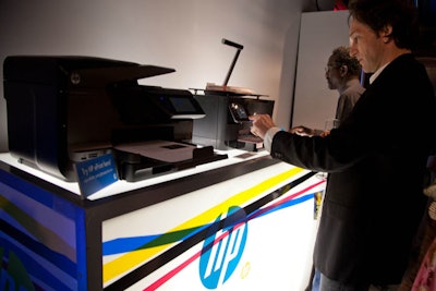 Beyond the vignettes, HP displayed its new printers, inviting attendees to play with functions, including one that allows users to print from the devices via email.