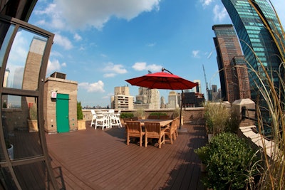 Outdoor roof deck with Central Park and Times Square views.
