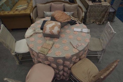 Nuage Designs displayed its new Shabby Chic line of linens and furniture pieces, focused on blush tones and natural finishes.