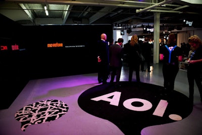 With so many different areas, AOL kept the design focused on all aspects of its brand, with speech-bubble-shaped carpets in the signature black-and-white color scheme and TV screens displaying content attached to walls that hid the back-of-house production.