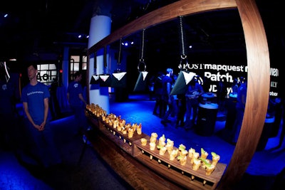 A wooden frame held deep-fried pasta in paper cones and envelopes of napkins. The filling fare included a combination of shrimp, avocado, herbs, and lemon; there were also chicken and meat combos.