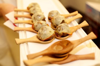 Hors d'oeuvres included meatballs topped with smoked mozzarella served in spoons.
