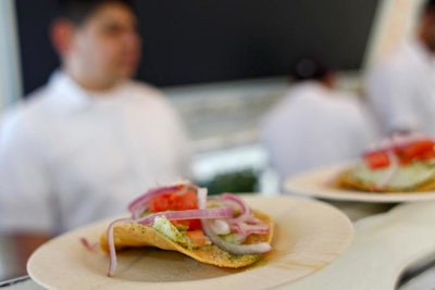 In keeping with the low-key affair, Tacombi's tacos were served on lightweight, recycled plates and designed to be eaten with your hands.