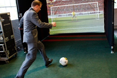 Guests flaunted their ball-playing talents at an area the organizers set aside for a soccer simulator.