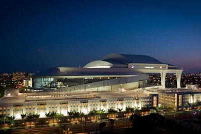 Sunset and the exterior view of the Marlins Park facility in Little Havana.