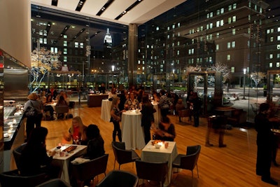 A cocktail reception in The Cube with adjacent taxi drop-off