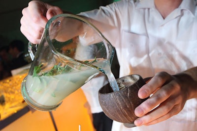 Waiters served three Cuban-inspired cocktails, including one in a coconut glass.
