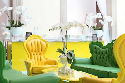 Bright yellow and green Victorian-inspired lounge furniture gave Walker Court a bold look. Cocktail tables and bars were topped with white orchids.
