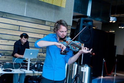 Electric violinist Dr. Draw gave a high-energy performance during the event.