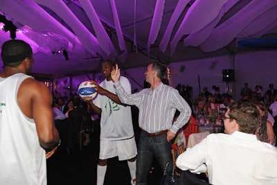 Members of the Harlem Wizards performed some basketball tricks between speakers.