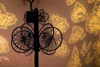 Event Creative created chandeliers made out of bicycle wheels.