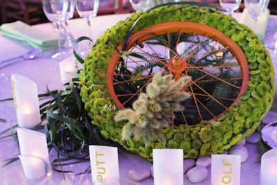 Designer Matthew David Hopkins incorporated bicycle wheels into some of the centerpieces as a nod to how bike riders use the park.